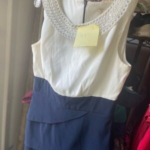 Elegant White and Navy Dress with Pearl Collar